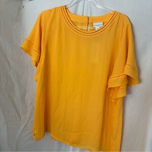 Liz Claiborne yellow blouse with sleeve and neckline detail.